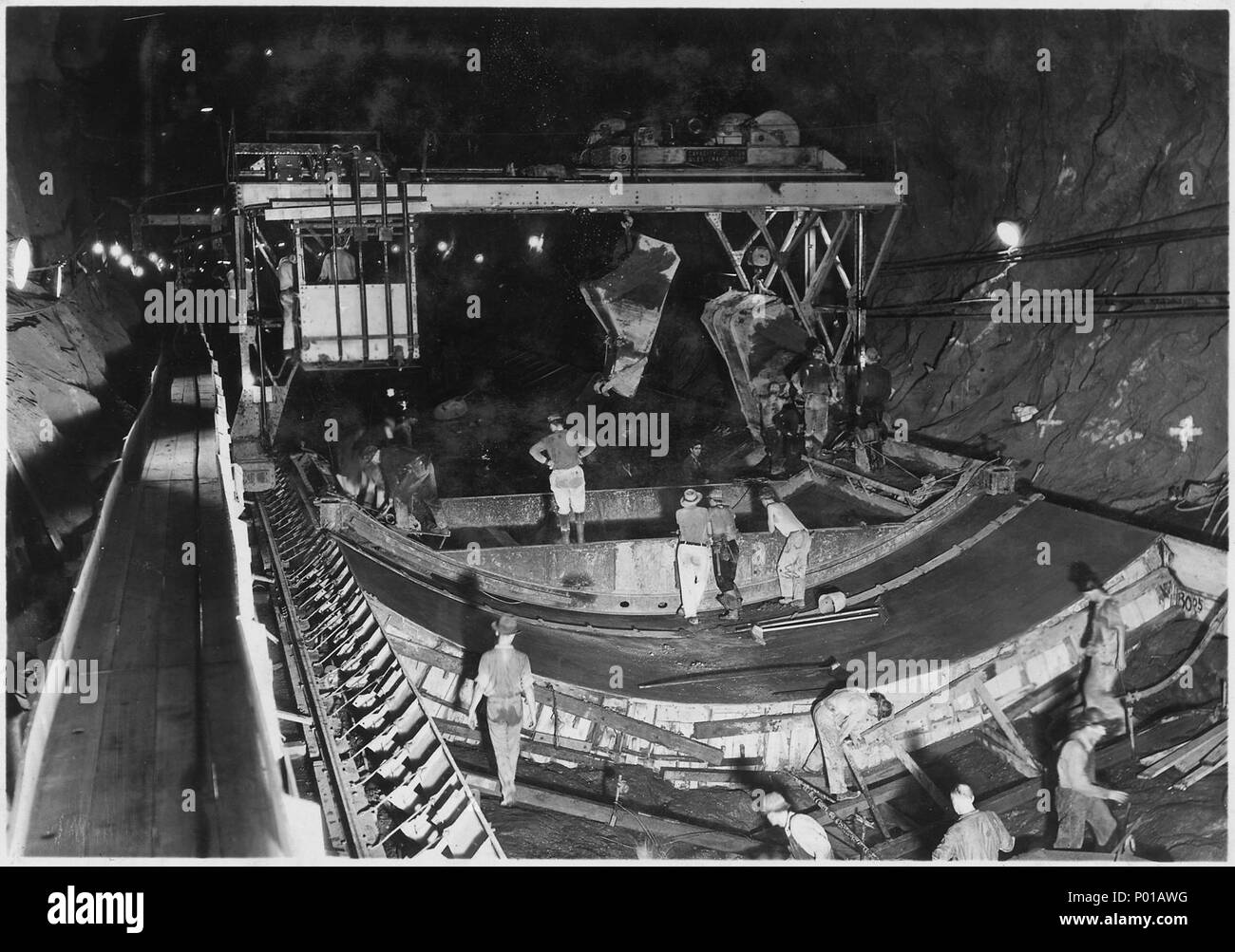 Pouring invert concrete in diversion tunnel No. 3. See also previous ...