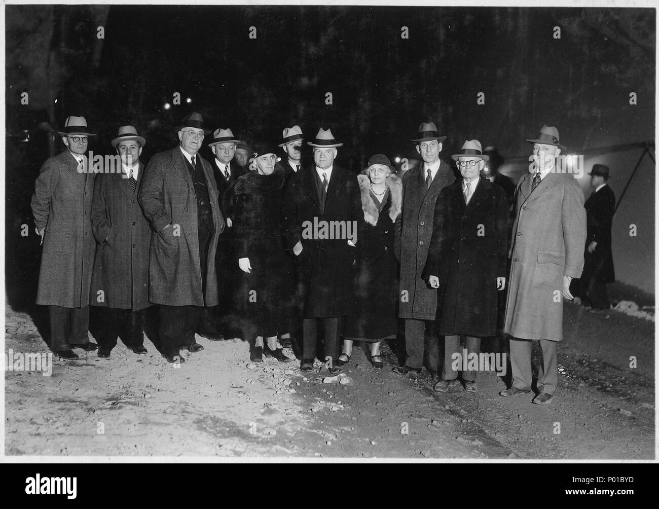 President Herbert Hoover and official party in Tunnel No. 2 during inspection tour of Boulder Canyon Project. Left... - Stock Photo