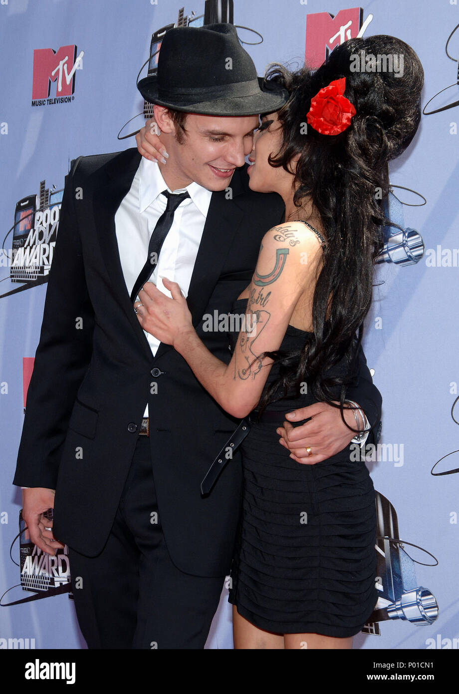 Amy Winehouse at the MTV Movie Awards at the Universal Amphitheatre in Los  Angeles. 3/4 head to belt black dress WinehouseAmy 273 Event in Hollywood  Life