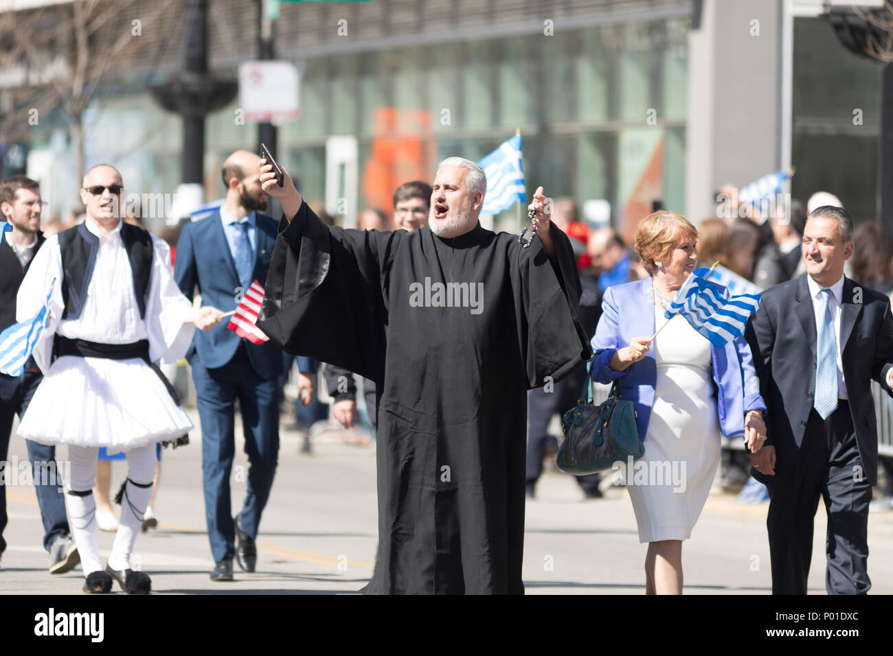 Chicago, Illinois, USA - April 29, 2018  An orthodox priest in the Greek Independence  Day Parade Stock Photo