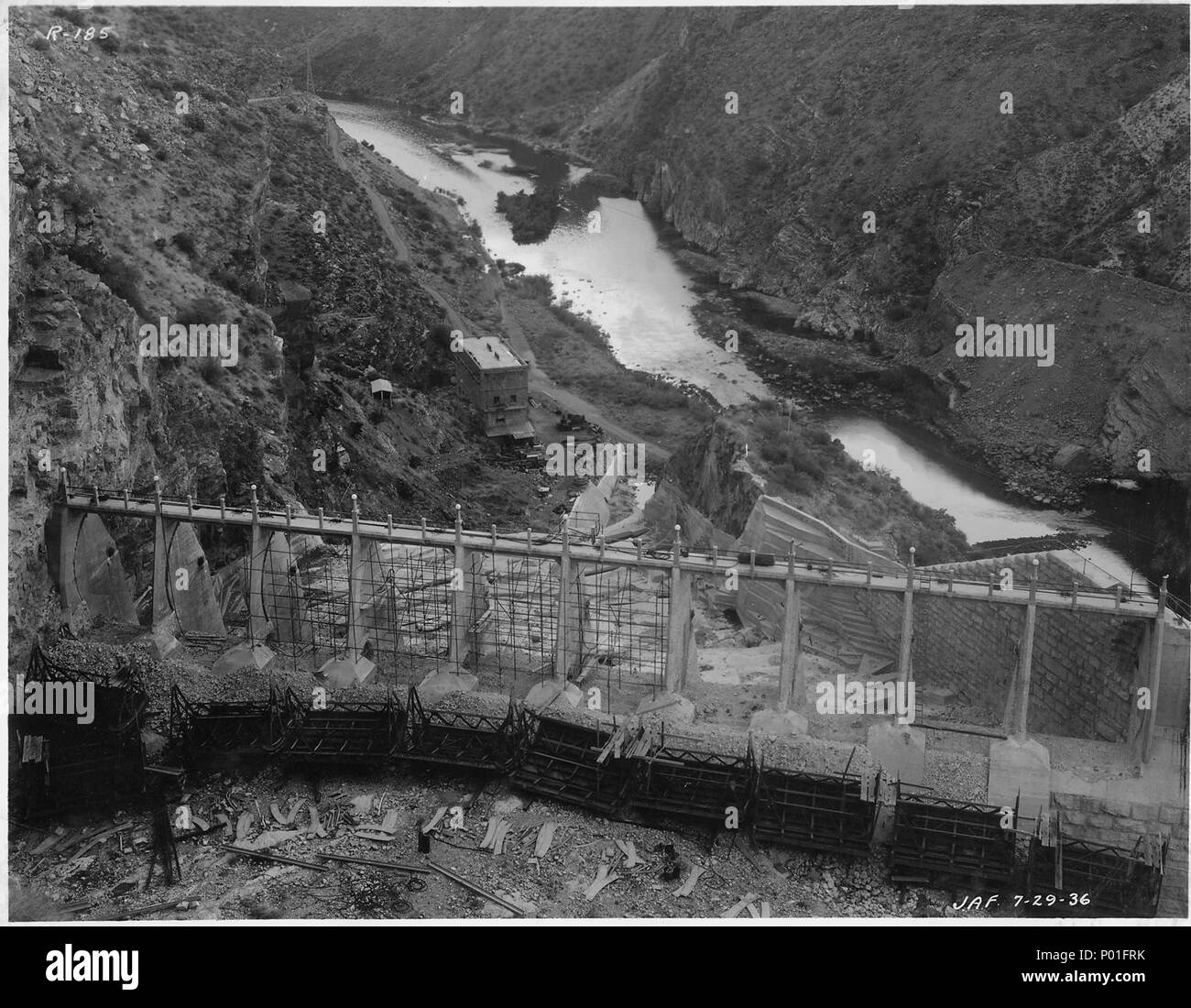Roosevelt Dam. View of south spillway showing progress of concrete
