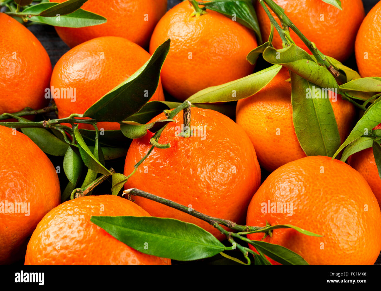 Fresh tangerines in an old bag of leaves. 32029244 Stock Photo at Vecteezy