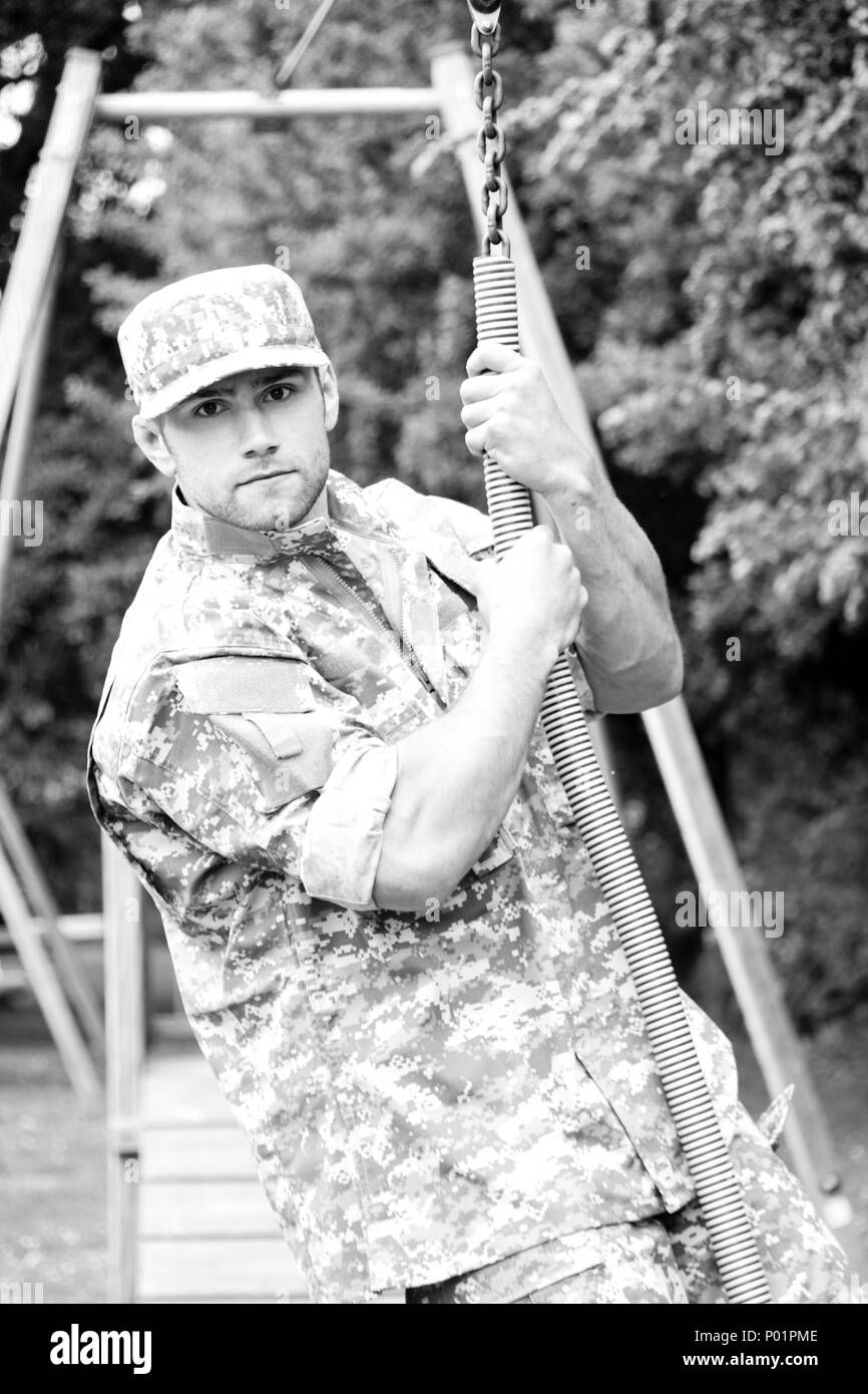 Muscle men in military uniform Muscle men in military uniform think