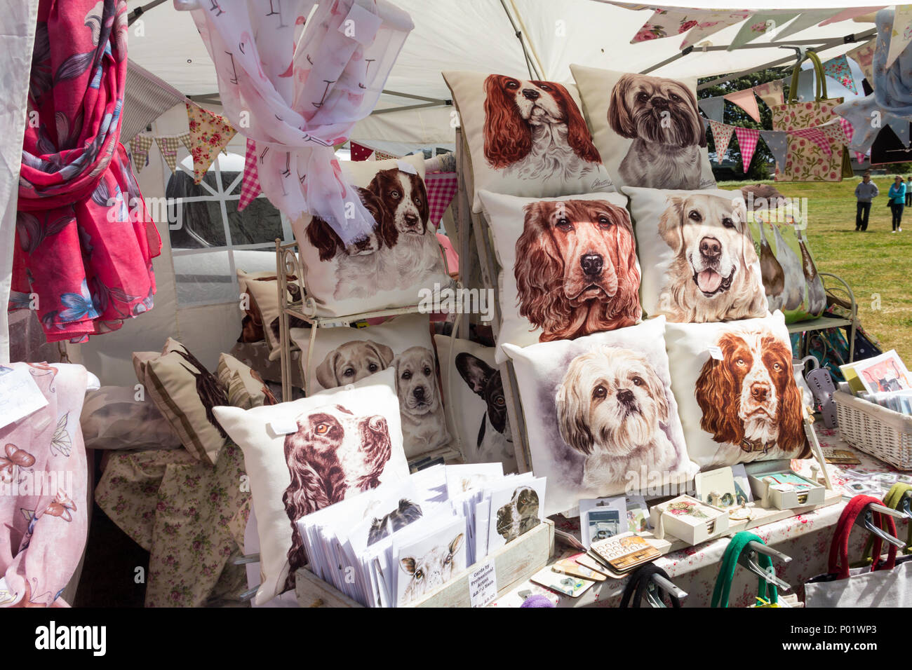Trade stall selling craft items at the Arthington show, West Yorkshire in 2017, including cushions and greetings cards featuring various dog images. Stock Photo