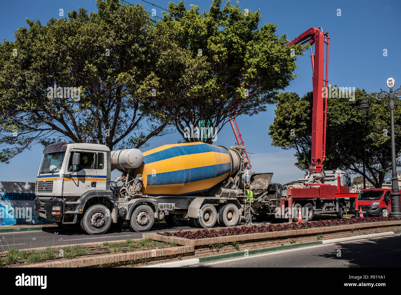 truck delivers ready mixed cement to building site, Stock Photo