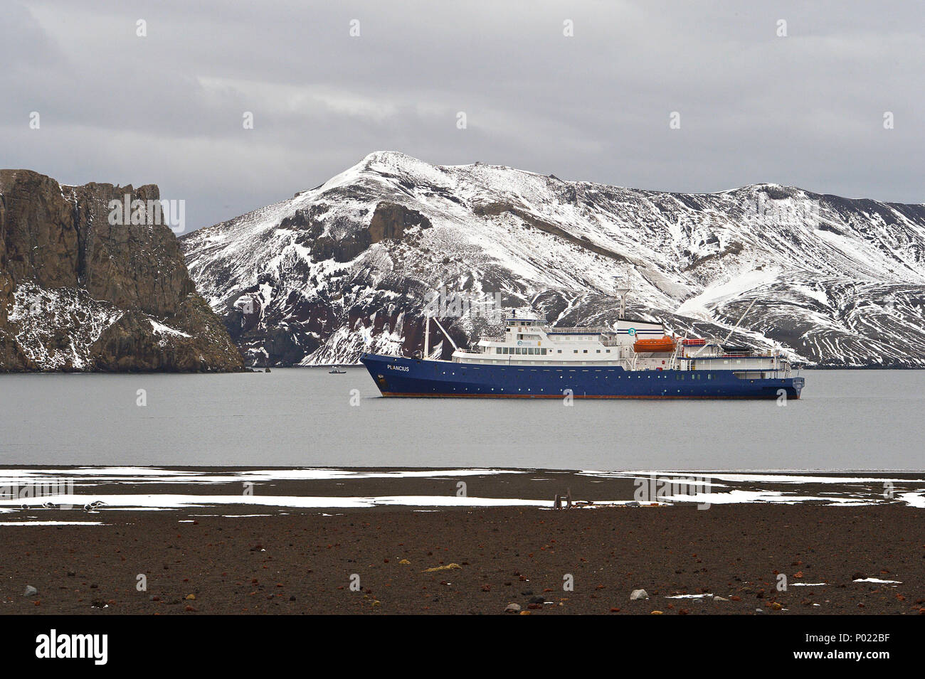 Expedition ship M.V. Plancius at Whalers Bay, Deception Island, South Shetland Islands, Antarctica Stock Photo