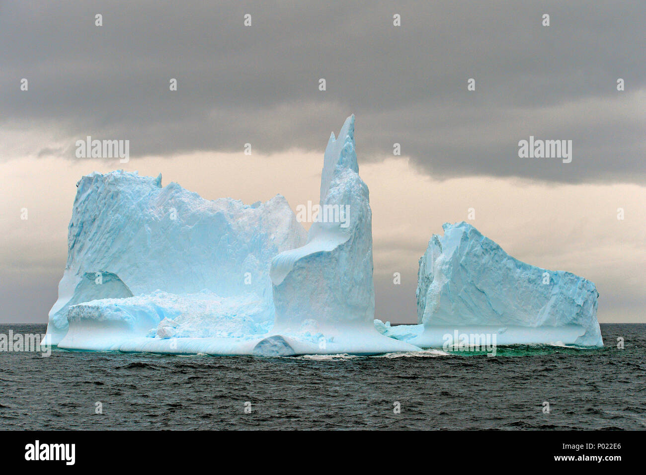 Tabular iceberg drift at Charlotte Bay, Danco coast, Grahamland. Antarctica Stock Photo