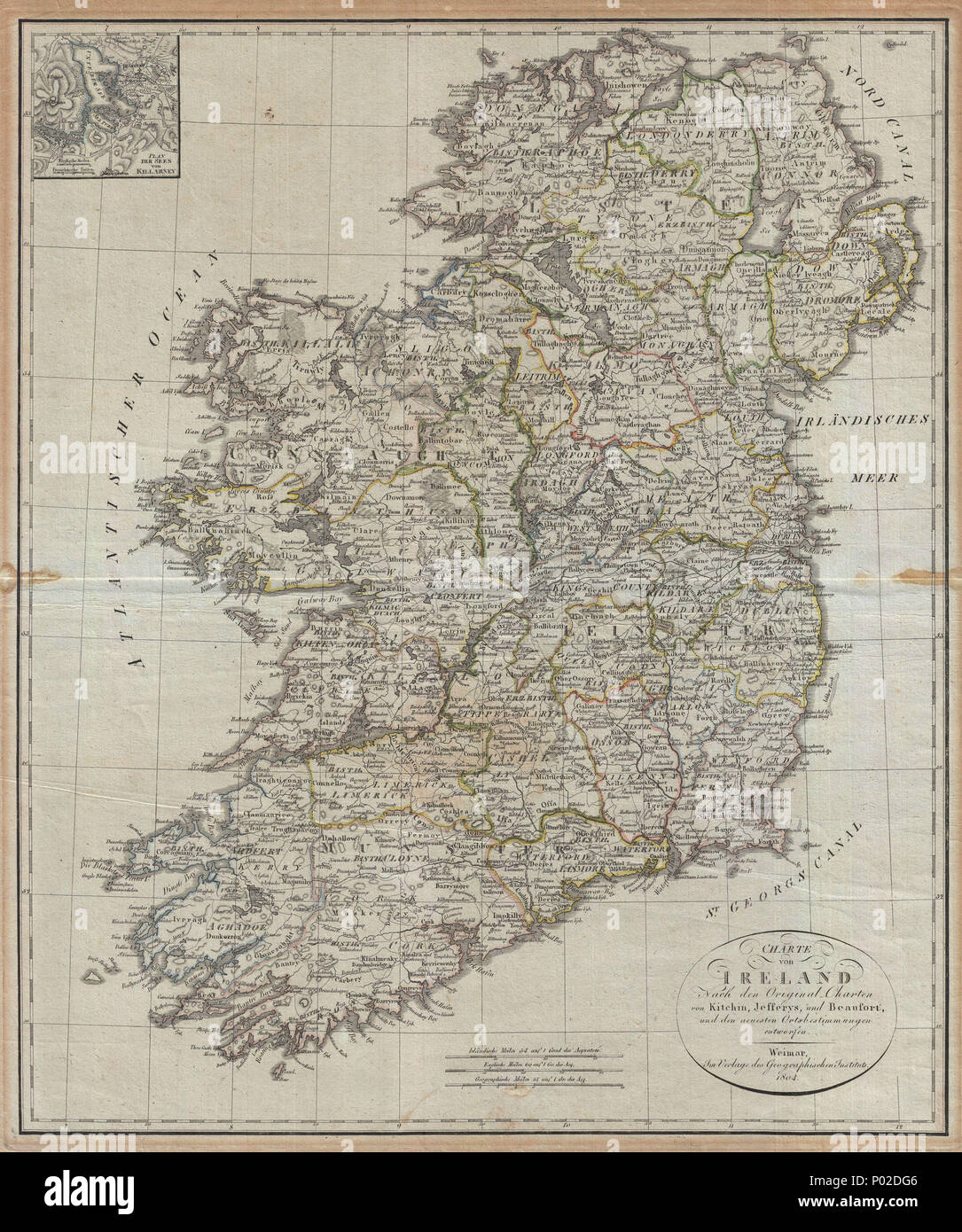 .  English: An uncommon map of Ireland dating to 1804. Though published by the German Geographical Institute, this map references the earlier work of Thomas Kitchin, Thomas Jefferys, and Daniel Beaufort. Covers the entirety of Ireland with exceptional detail throughout. Color coded in outline form at the county level. An inset of Killarney appears in the upper left quadrant. Text in English and German.  . Charte von Ireland Nach den Original-Charten von Kitchin, Jefferys, und Beaufort, und den neuesten Ortsbestimmungen entworfen. 1804 (dated) 19 1804 Jeffreys and Kitchin Map of Ireland - Geogr Stock Photo