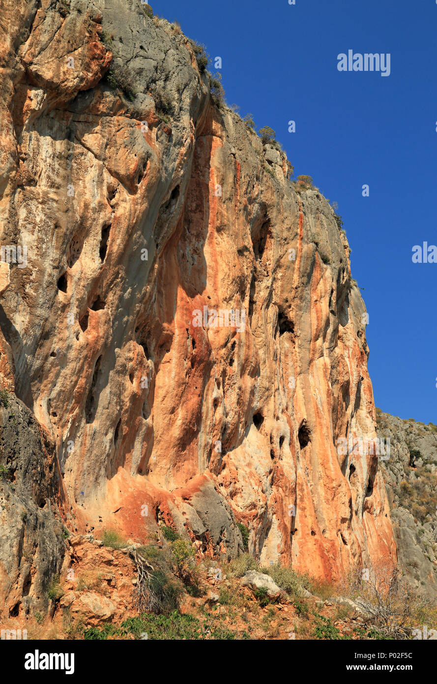 Cliff rock climbing area at Nafplio coast mountains, Greece Stock Photo