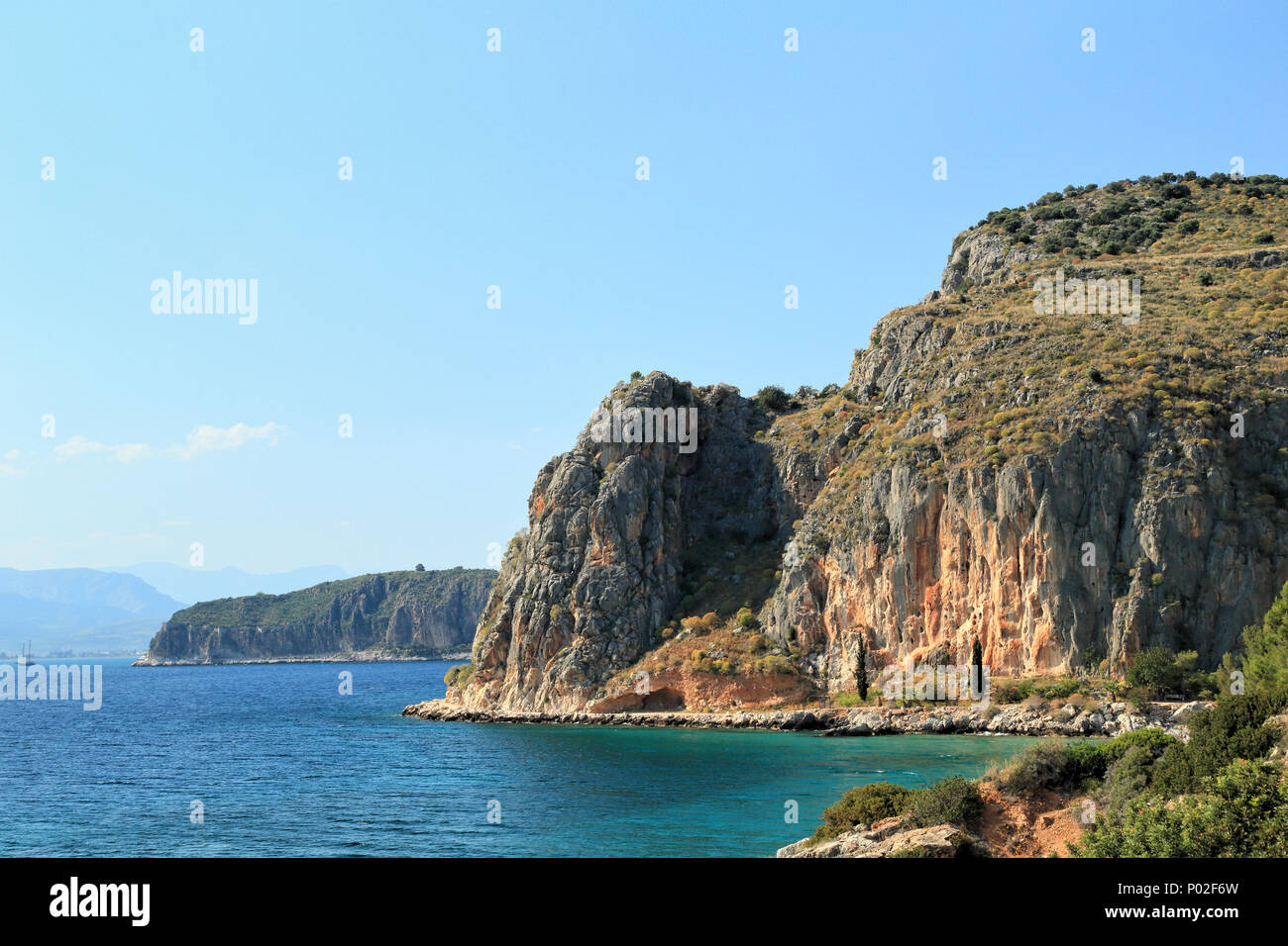 Coastal cliff climbing mountain, Greece Stock Photo