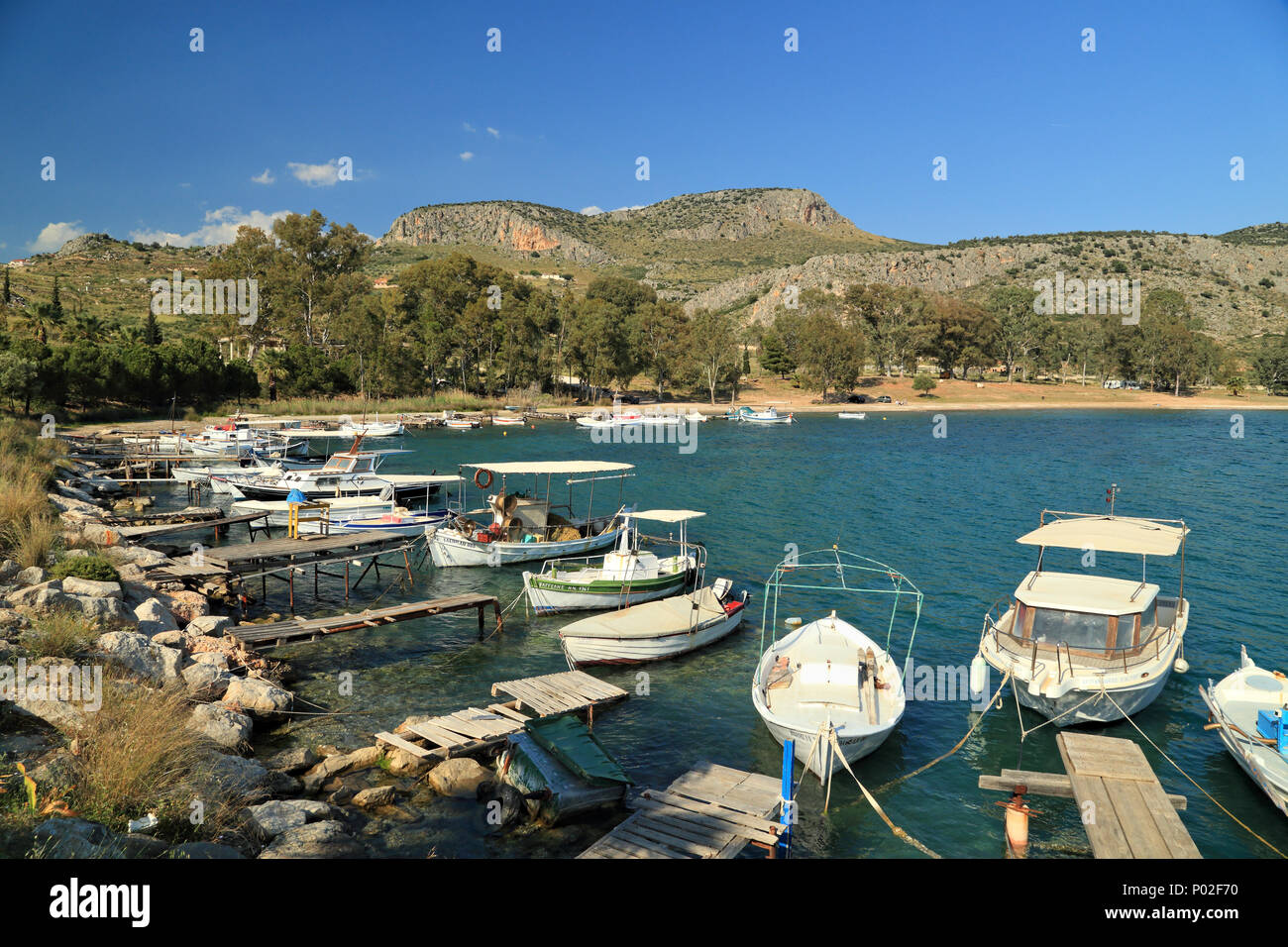 Fishing boats at Karathona beach, Nafplio, Greece Stock Photo