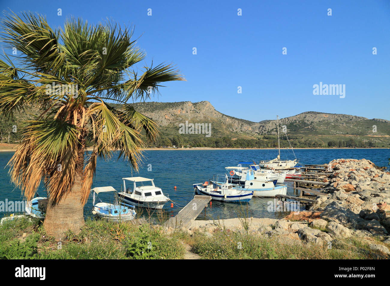 Fishermen boats at Karathona beach, Nafplio, Greece Stock Photo
