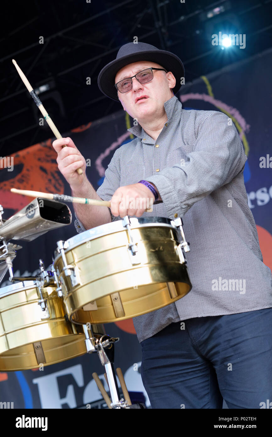 Jah Wobble (John Wardle) performing at Wychwood Festival, Cheltenham, UK. June 1, 2018 Stock Photo