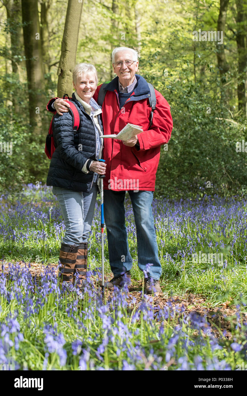 Couple walking through woodland hi-res stock photography and images - Alamy
