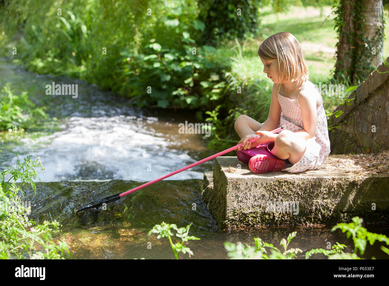 Download Beautiful Picture of a Young Girl Fishing in a Scenic River PNG  Online - Creative Fabrica