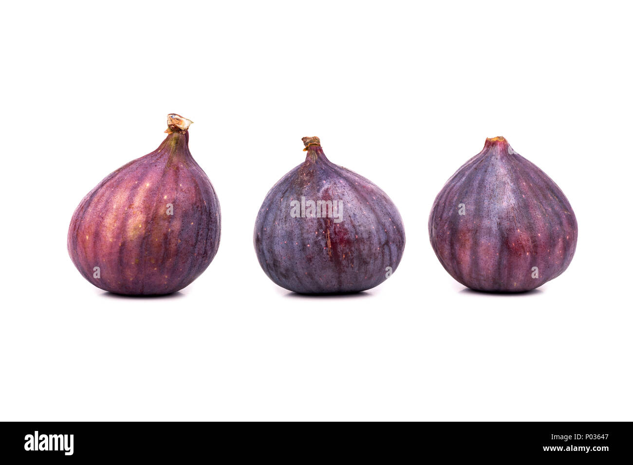 3 Ripe Figs Three fresh and ripe figs isolated on white background Stock Photo - Alamy