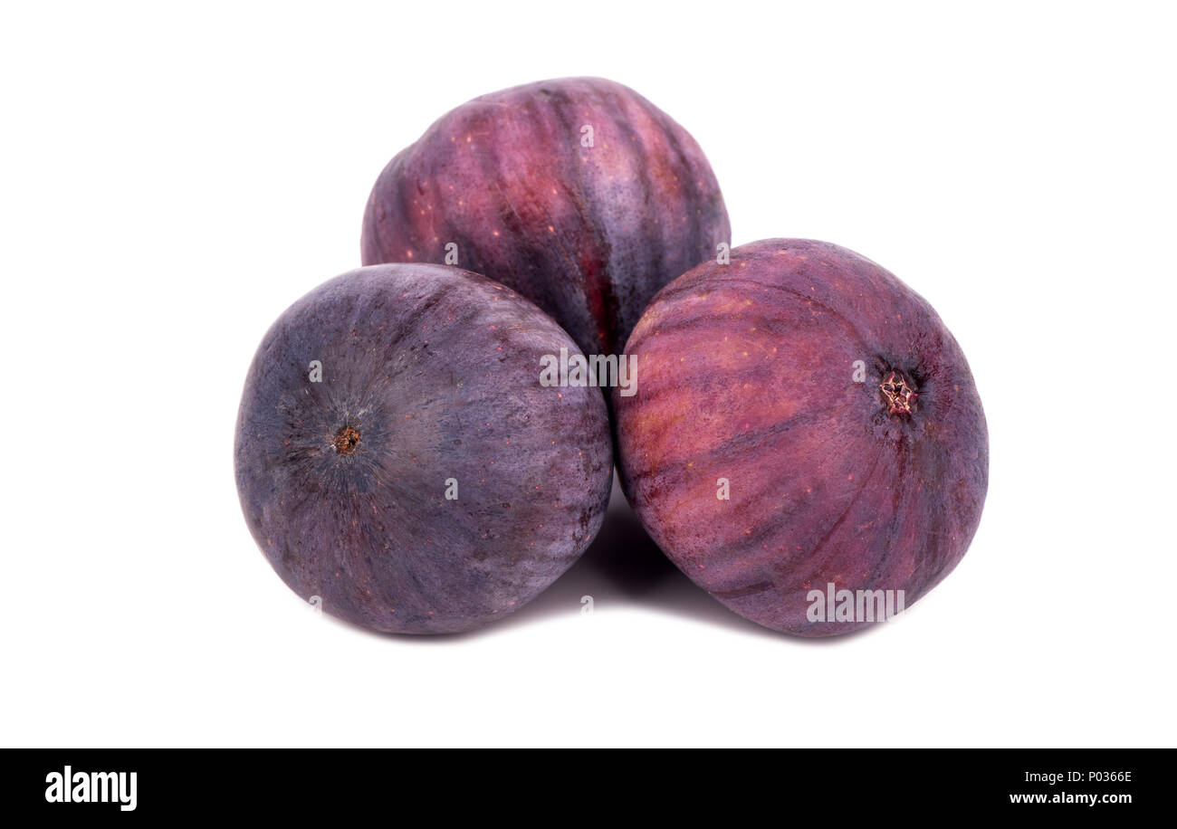 3 Ripe Figs Three fresh and ripe figs isolated on white background Stock Photo - Alamy