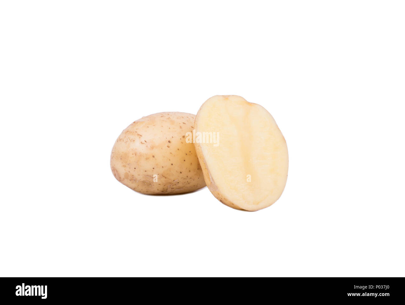Fresh raw potatoes cut in half on a white background Stock Photo - Alamy