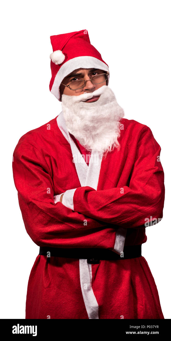 Sad young and skinny Santa Claus in glasses on a white background Stock Photo