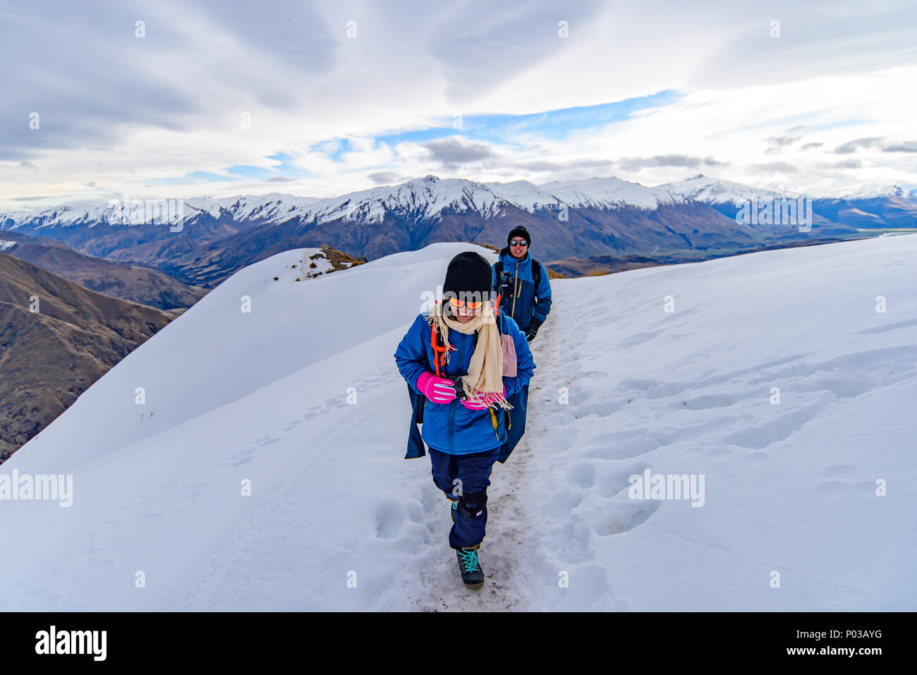 Hiking in the snow mountains, Roy's Peak, New Zealand Stock Photo
