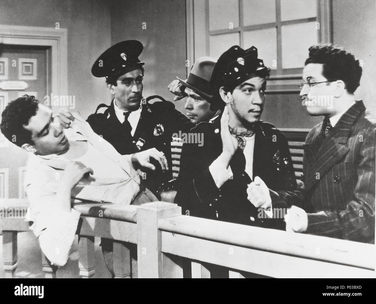 Original Film Title: GENDARME DESCONOCIDO, EL.  English Title: UNKNOWN POLICEMAN, THE.  Film Director: MIGUEL M. DELGADO.  Year: 1941.  Stars: CANTINFLAS. Credit: POSA FILMS, S.A. / Album Stock Photo