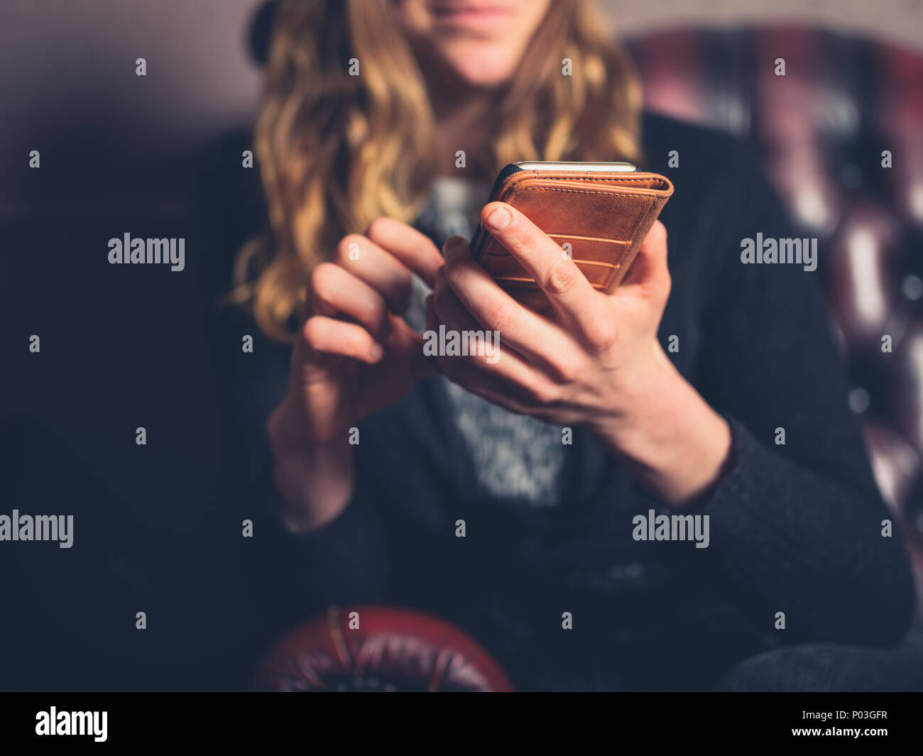 Lifestyle woman on sofa luxury hi-res stock photography and images - Alamy