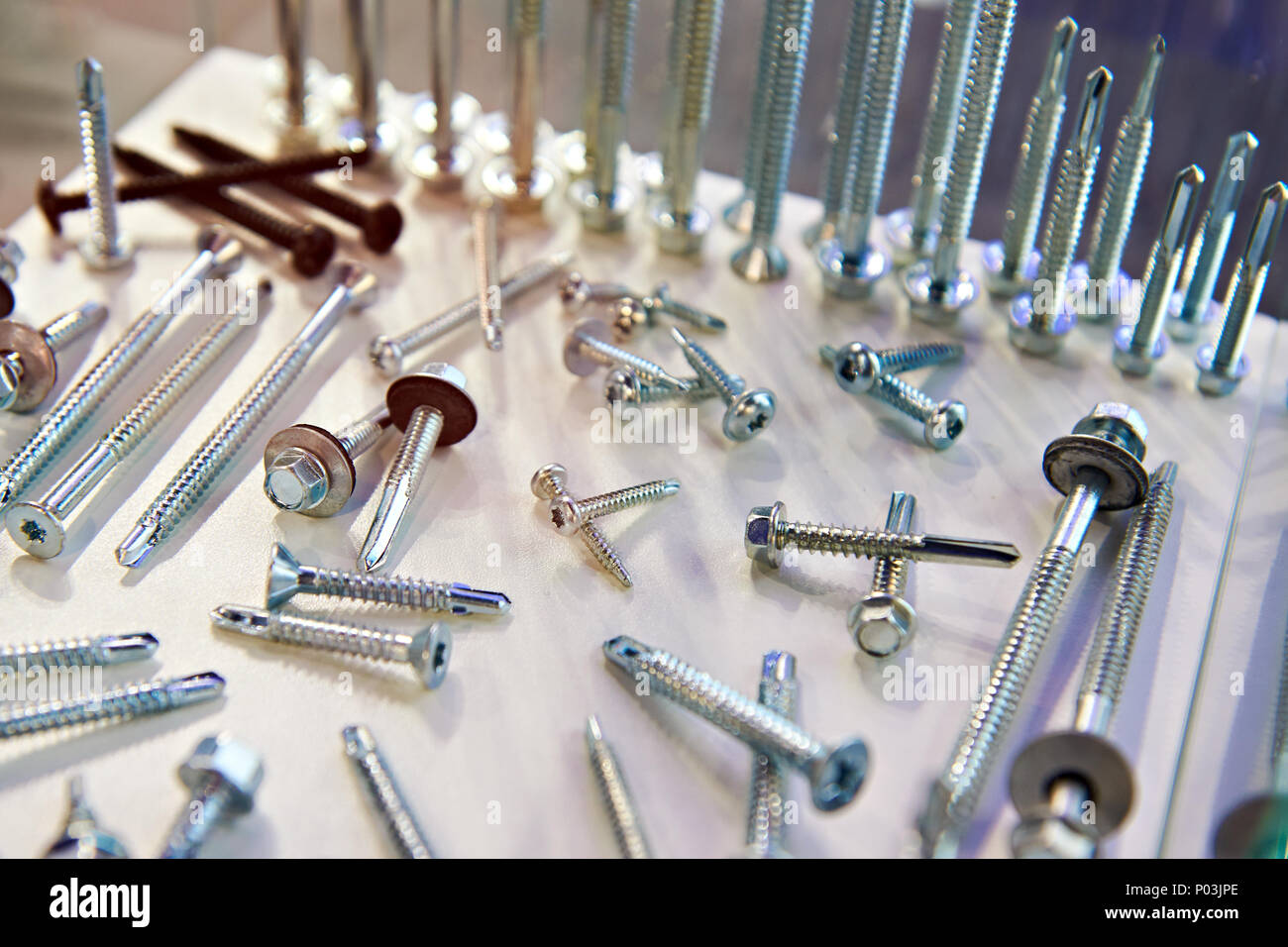 Selftapping screws on table Stock Photo Alamy