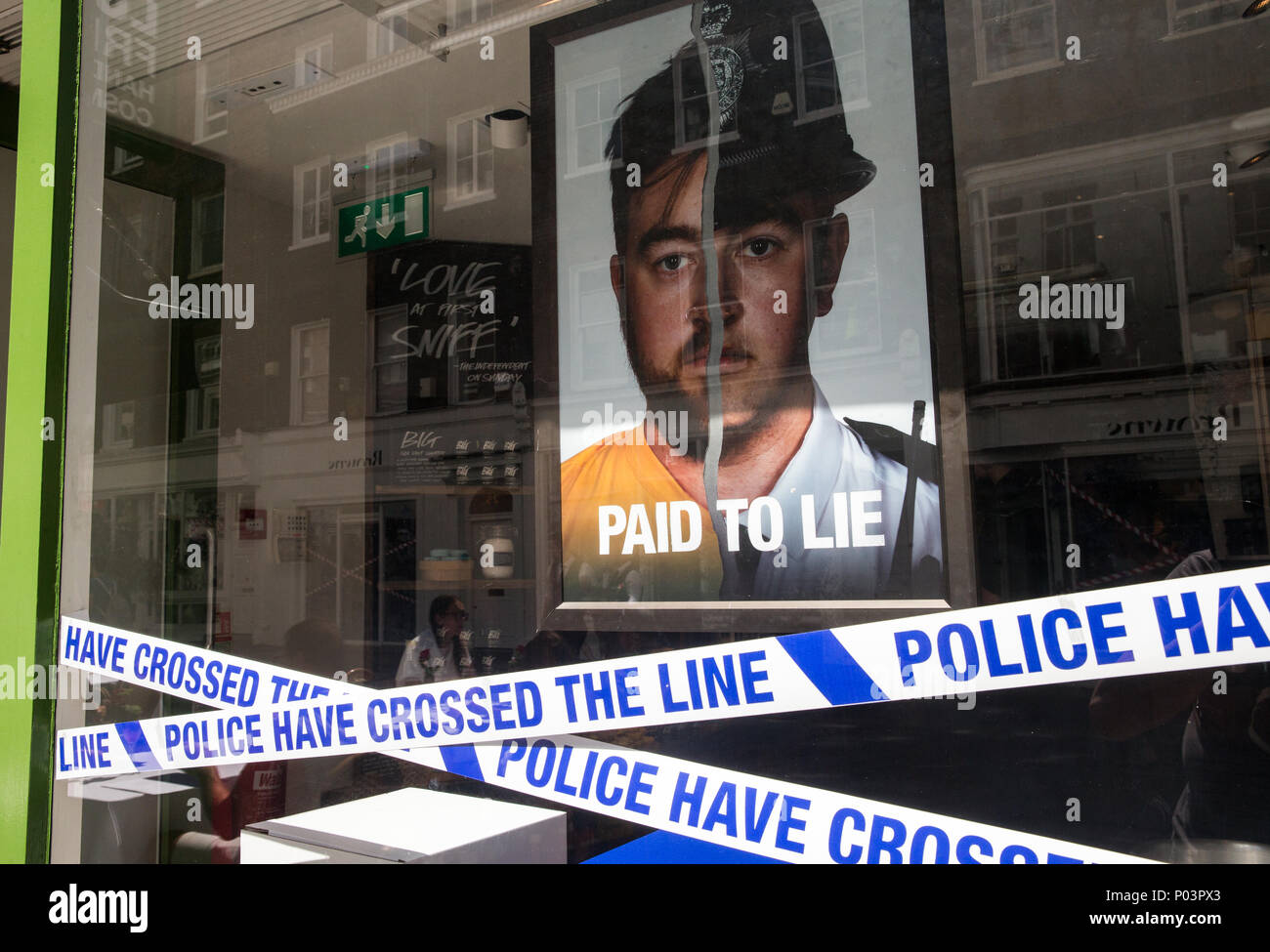 Cosmetic store, Lush,with its Spycops display in the window in Bond Street. It focussed on undercover police working to get information from activists. Stock Photo