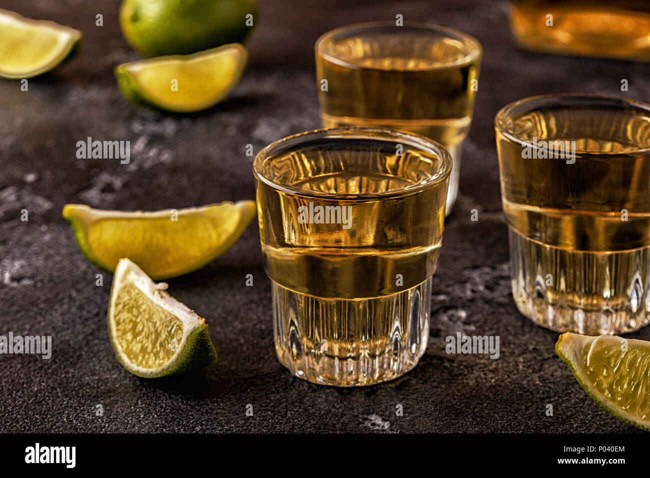 Tequila in shot glasses with lime and salt, selective focus Stock Photo ...