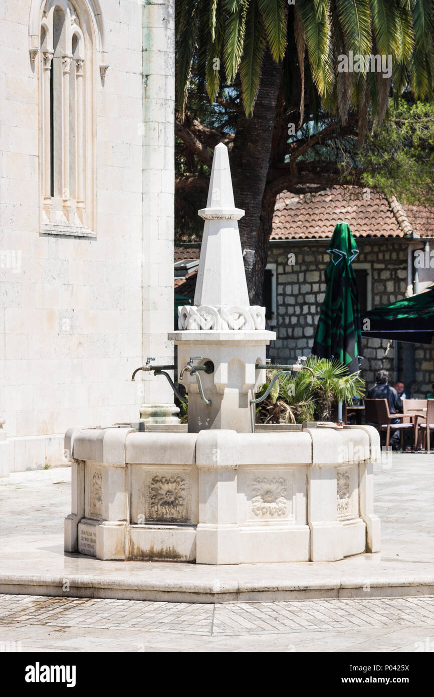 White medieval fountain at Belavista Square, Herceg Novi, Montenegro. Stock Photo