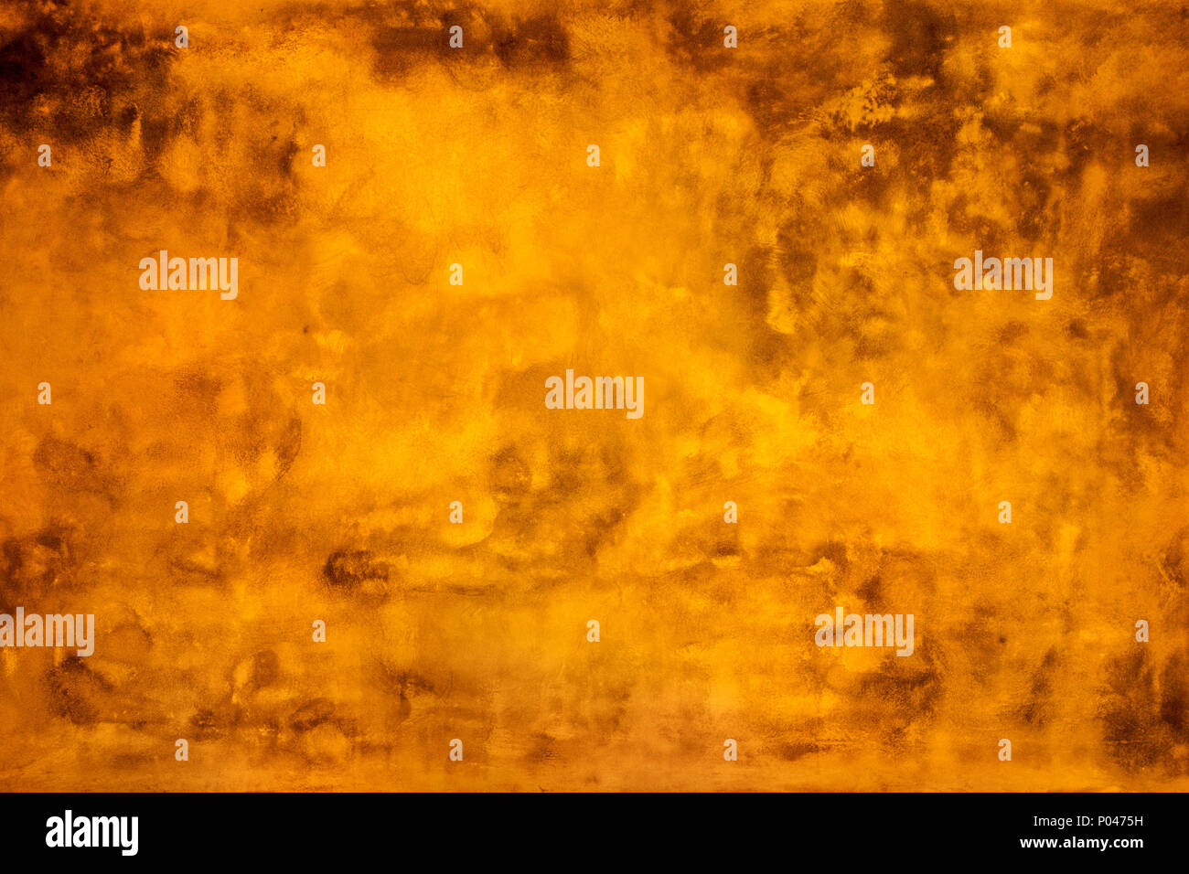 Grunge yellow painted wall texture background. Stock Photo