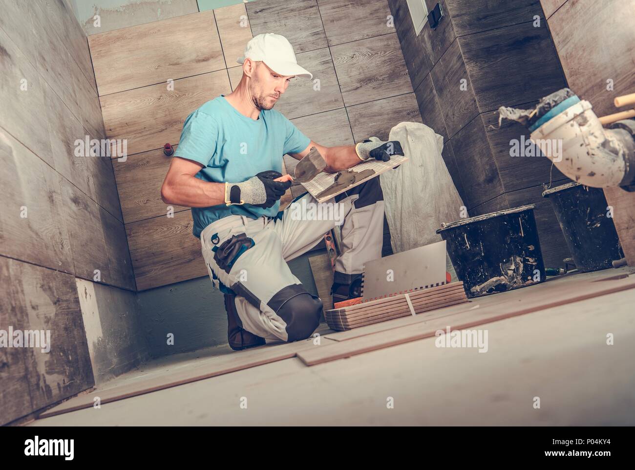 Tile Contractor Bathroom Remodeling by Men. Caucasian Ceramic Tiles Installer During ...