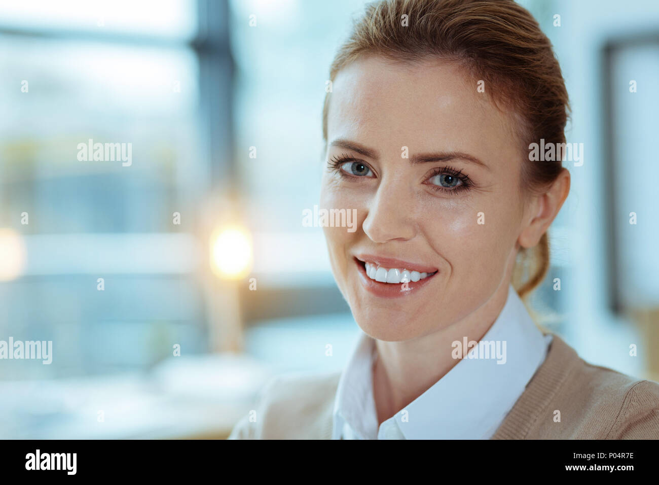 Portrait of pretty female that smiling on camera Stock Photo - Alamy