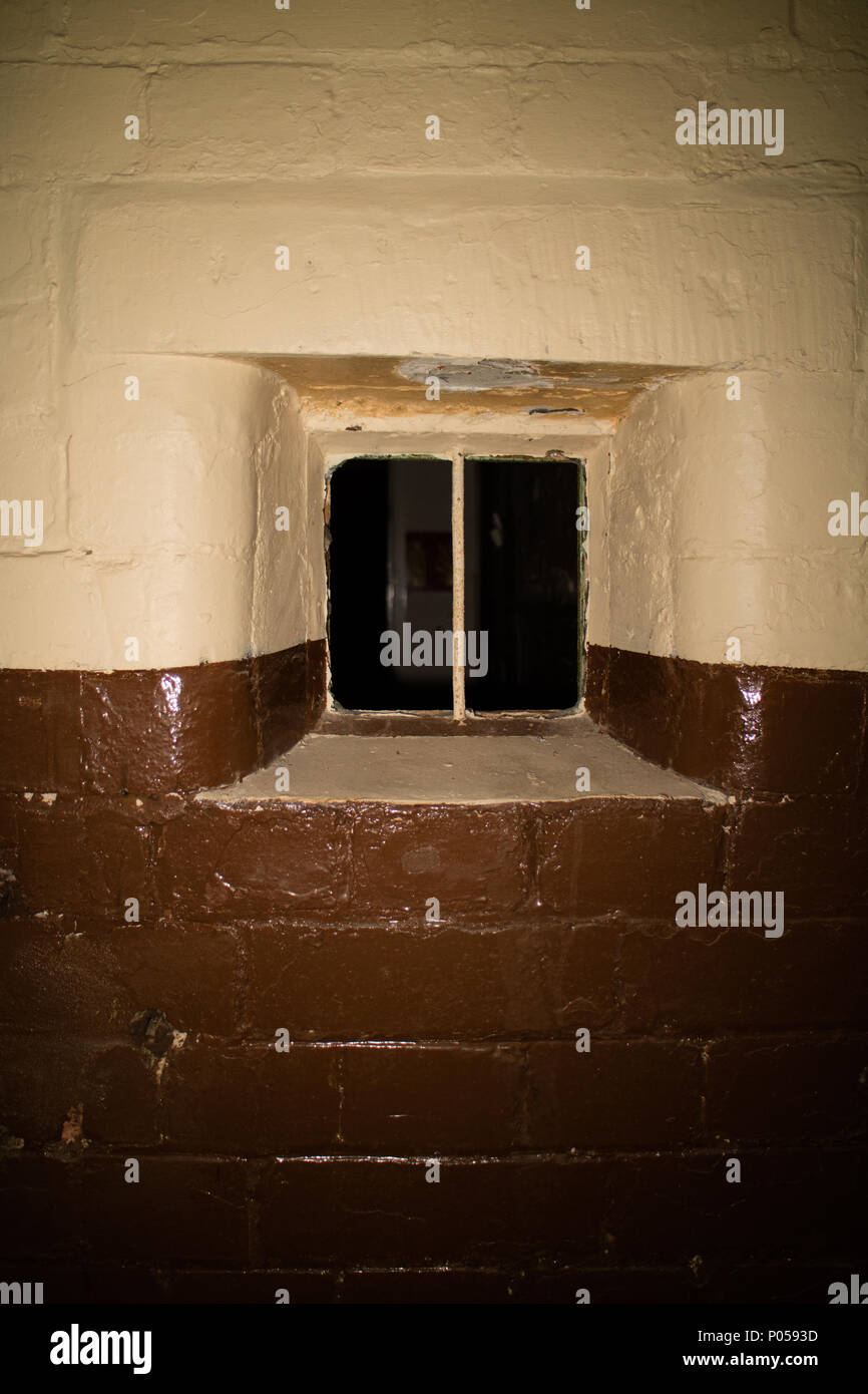 an old police prison cell window detail Stock Photo