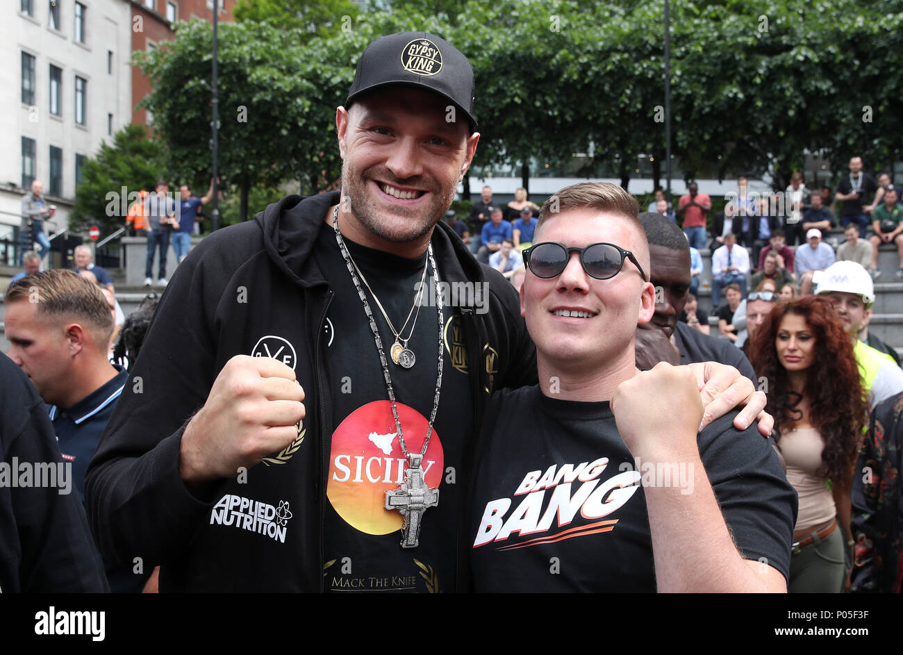 Tyson Fury (left) greets former boxer Nick Blackwell during the weigh-in at  The Great Northern, Manchester Stock Photo - Alamy