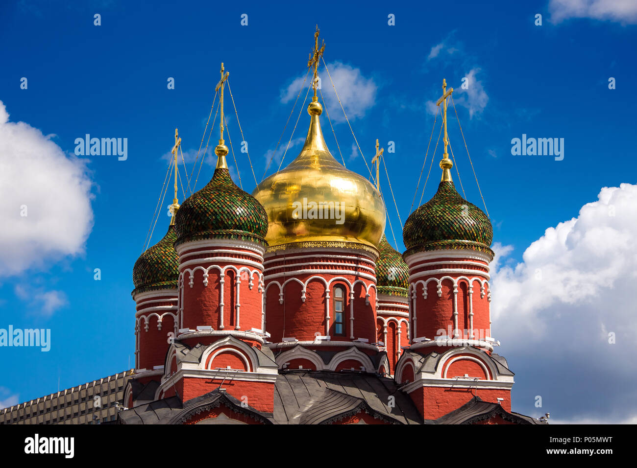 Domes of the christian church against the blue sky Stock Photo