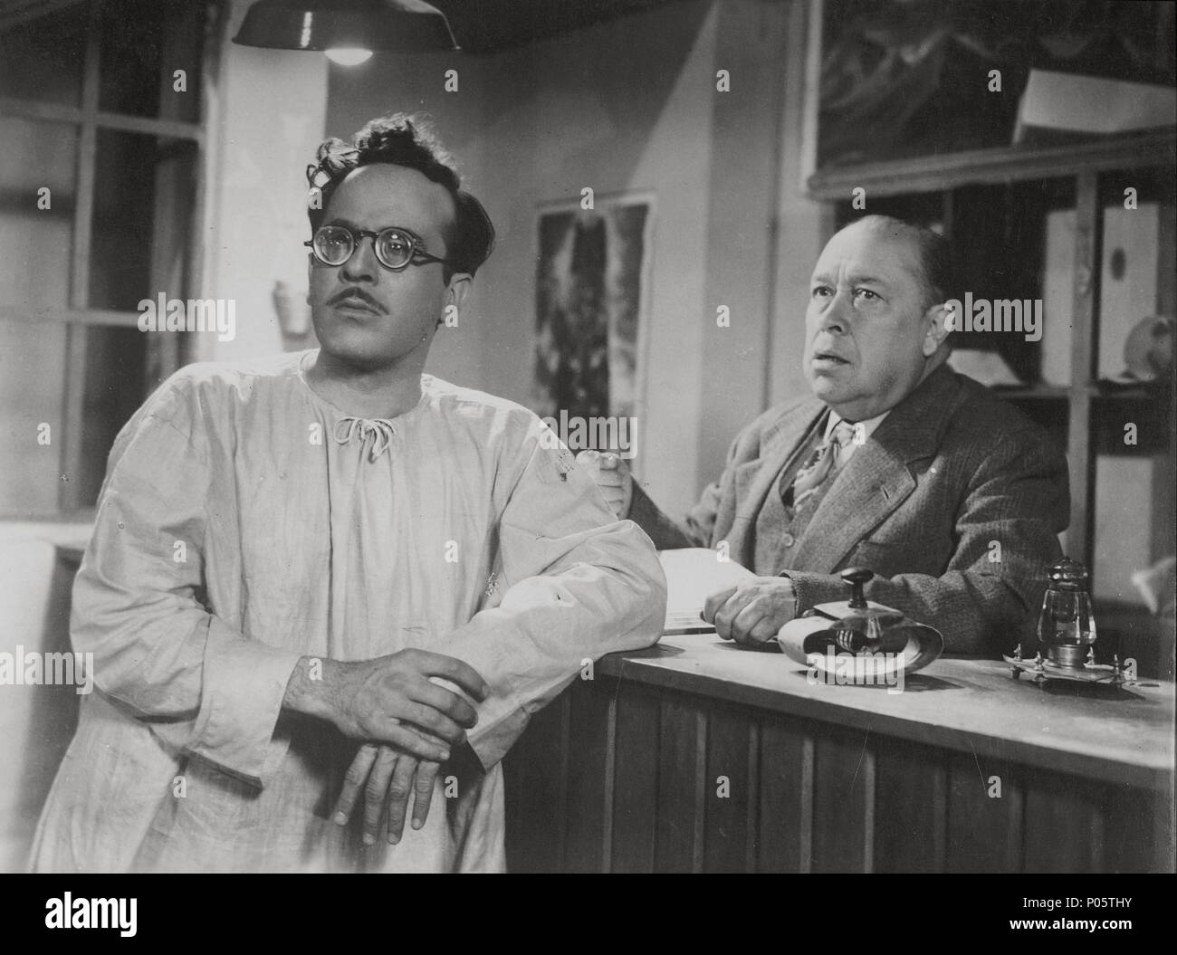 Original Film Title: TAMBIEN DE DOLOR SE CANTA.  English Title: TAMBIEN DE DOLOR SE CANTA.  Film Director: RENE CARDONA.  Year: 1950.  Stars: PEDRO INFANTE. Stock Photo