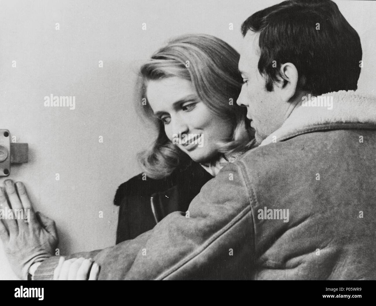 Original Film Title: MA NUIT CHEZ MAUDE.  English Title: MY NIGHT AT MAUD'S.  Film Director: ERIC ROHMER.  Year: 1969.  Stars: JEAN-LOUIS TRINTIGNANT; MARIE-CHRISTINE BARRAULT. Stock Photo