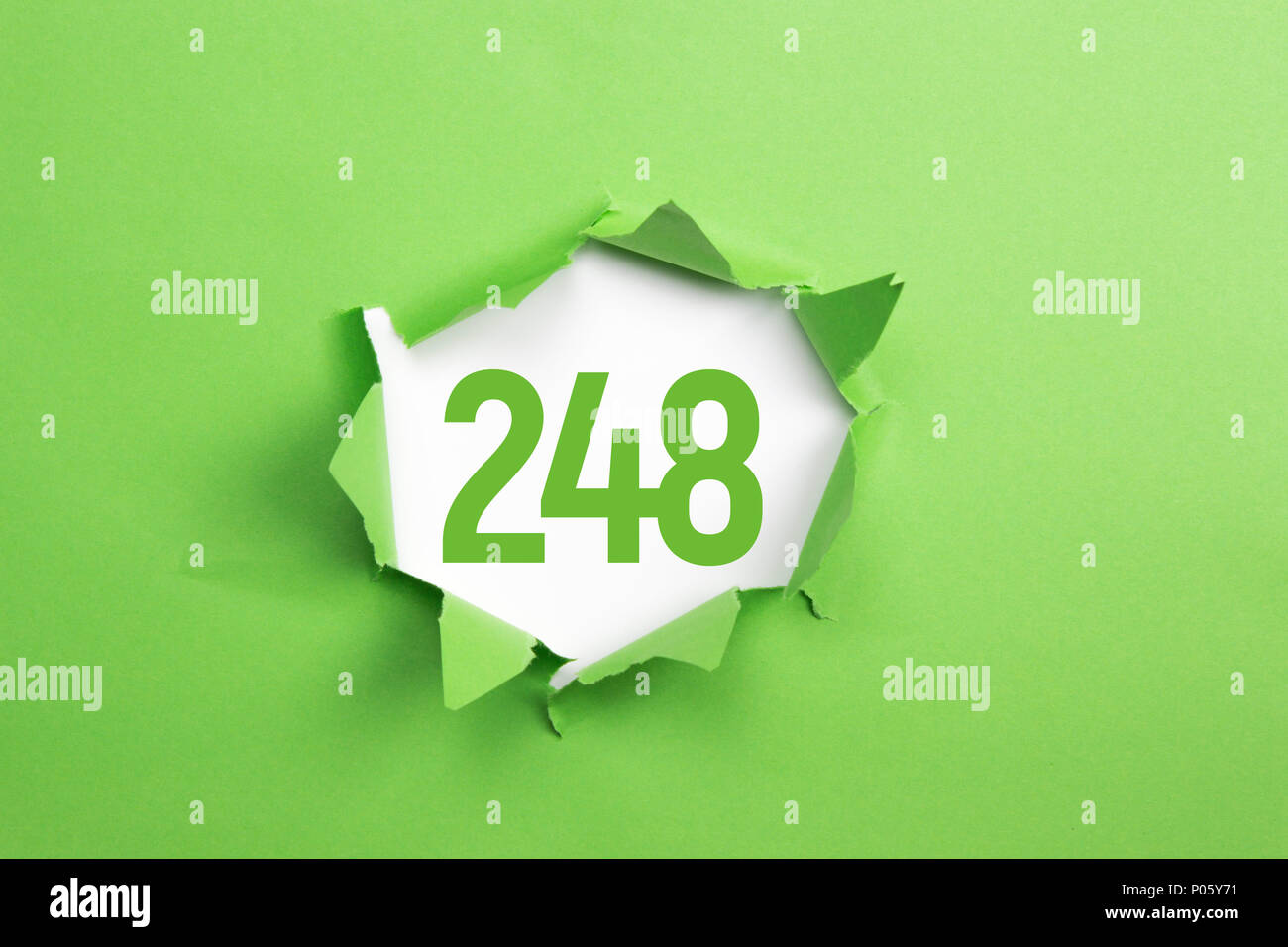 Green Number 49 on green paper background Stock Photo