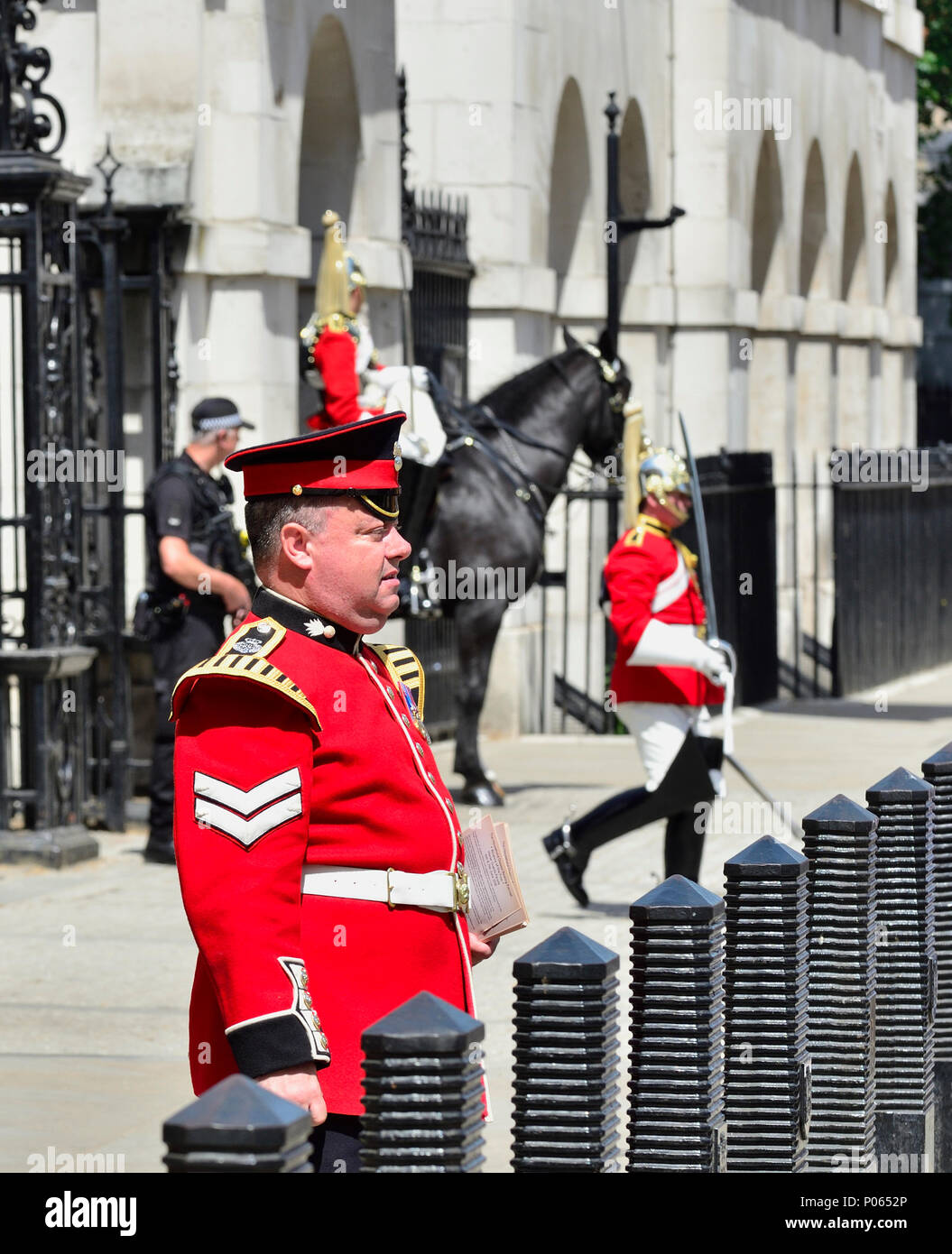 Member of the Grenadier Guards at the entrance to Horse Guards Parade, Whitehall, London, England, UK. Stock Photo