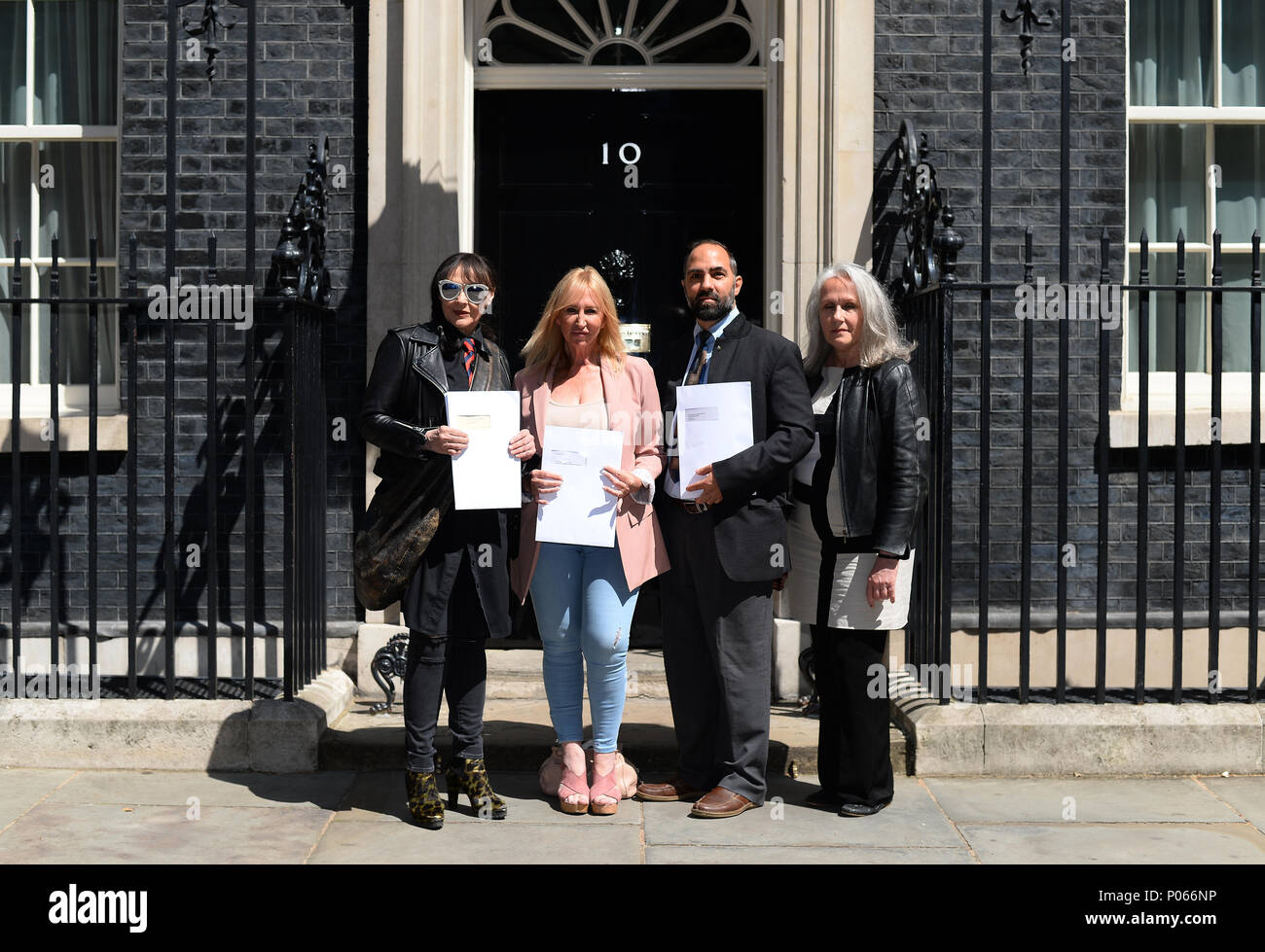 (left to right) Actress Frances Barber, Yvette Greenway, Andreas Ioannidis and Joanne Welch outside 10 Downing Street in London, where they delivered a letter of intent for the #BackTo60 campaign. Stock Photo