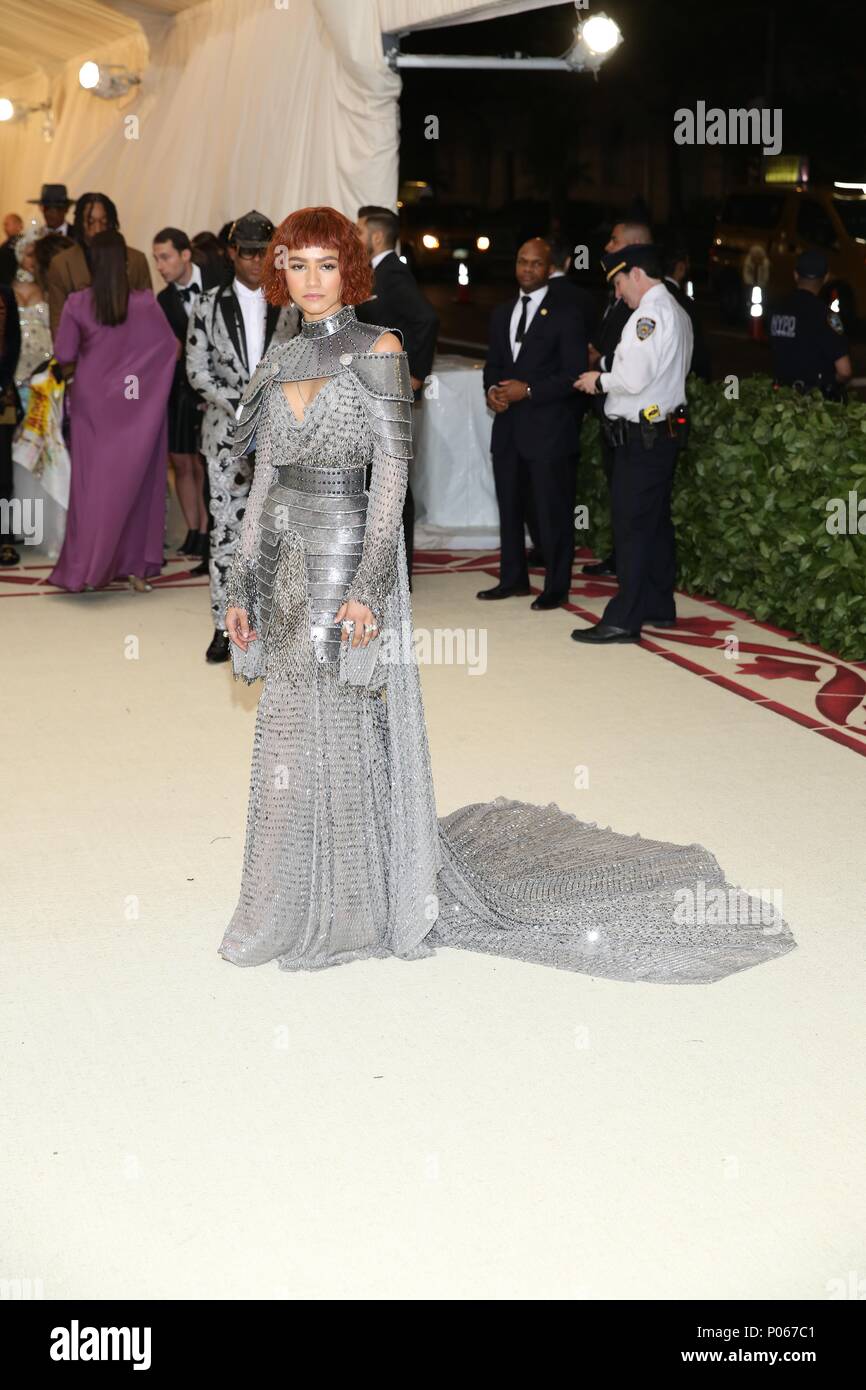 Silver armour style dress with high neck and open back hi res stock photography and images Alamy