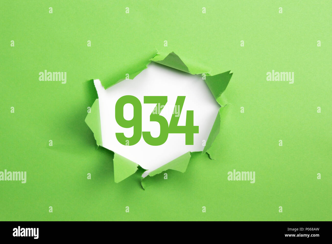 Green Number 934 on green paper background Stock Photo