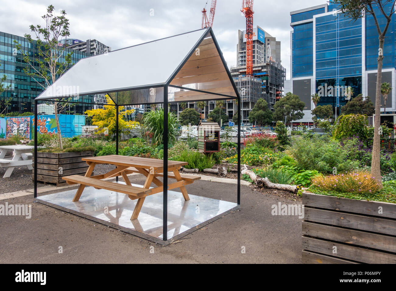 District Docklands Community Gardens surrounded by modern buildings. Melbourne, VIC Australia. The site was formerly an industrial wasteland. Stock Photo