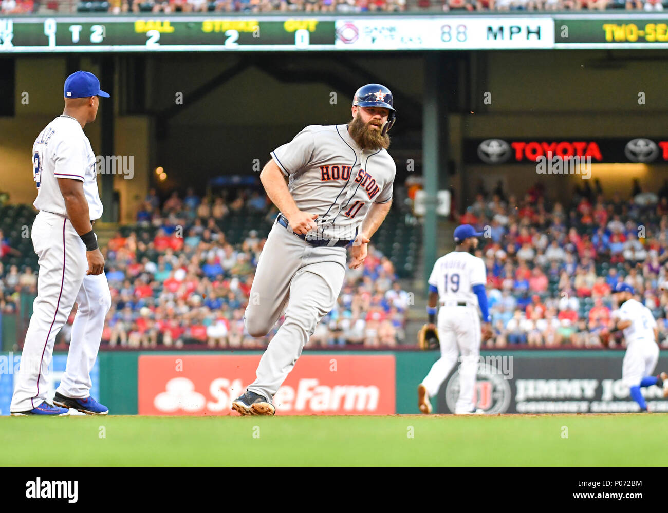 Jun 08, 2018: Houston Astros catcher Evan Gattis #11 rounds third base to score on an RBI single by Marvin Gonzalez in the second inning during an MLB game between the Houston Astros and the Texas Rangers at Globe Life Park in Arlington, TX Houston defeated Texas 7-3 Albert Pena/CSM Stock Photo