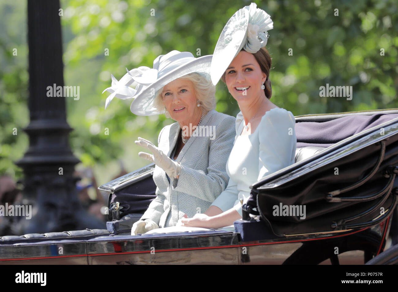 London, UK, 9 June 2018. HRH Catherine, Duchess of Cambridge and Camilla, Duchess of Cornwall ride a horse drawn carriage in the procession along The Mall, Trooping the Colour Credit: amanda rose/Alamy Live News Stock Photo