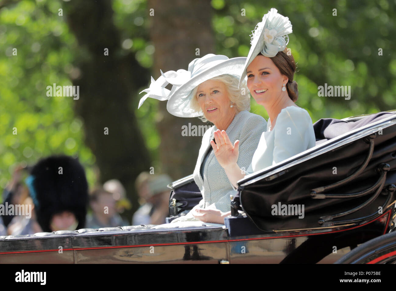 London, UK, 9 June 2018. HRH Catherine, Duchess of Cambridge and Camilla, Duchess of Cornwall ride a horse drawn carriage in the procession along The Mall, Trooping the Colour Credit: amanda rose/Alamy Live News Stock Photo