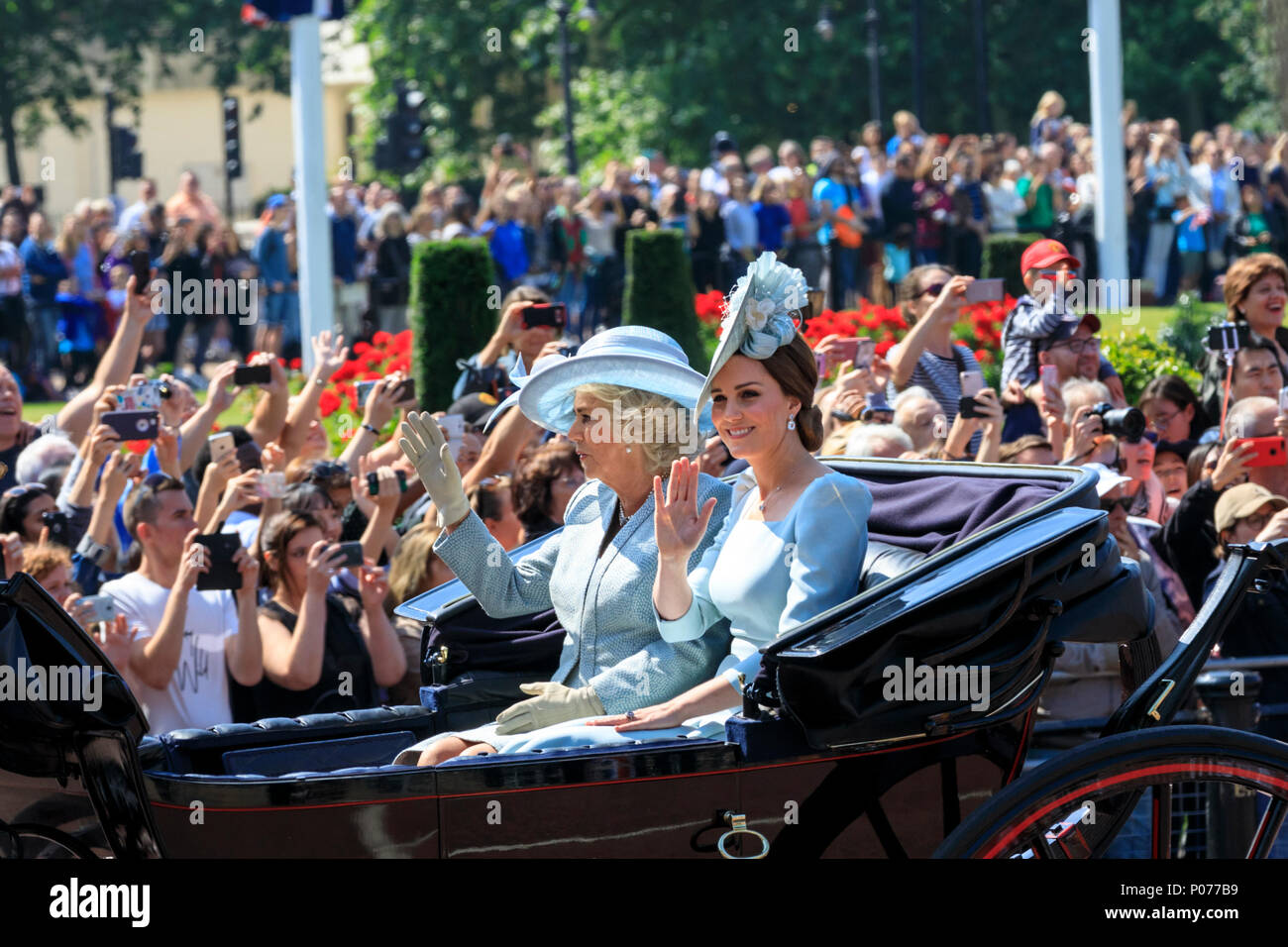 The Mall, London, UK, 9th June 2018. Catherine, Duchess of Cambridge and Camilla, Duchess of Cornwall in their carriage. The Sovereign's birthday is officially celebrated by the ceremony of Trooping the Colour, the Queen's Birthday Parade. Troops from the  Household Division, overall 1400 officers and soldiers are on parade, together with two hundred horses; over four hundred musicians from ten bands and corps of drums. The parade route extends from Buckingham Palace along The Mall to Horse Guards Parade, Whitehall and back again. Credit: Imageplotter News and Sports/Alamy Live News Stock Photo