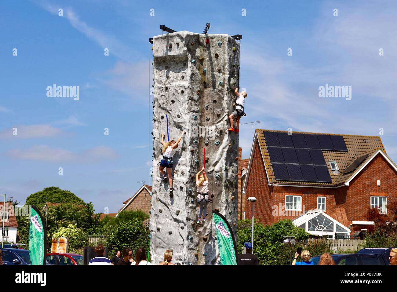 Ipswich, Suffolk, 9 June 2018. UK Weather: Hot bright and sunny for children on the climbing wall at the Kesgrave Family Fun Day. Stock Photo