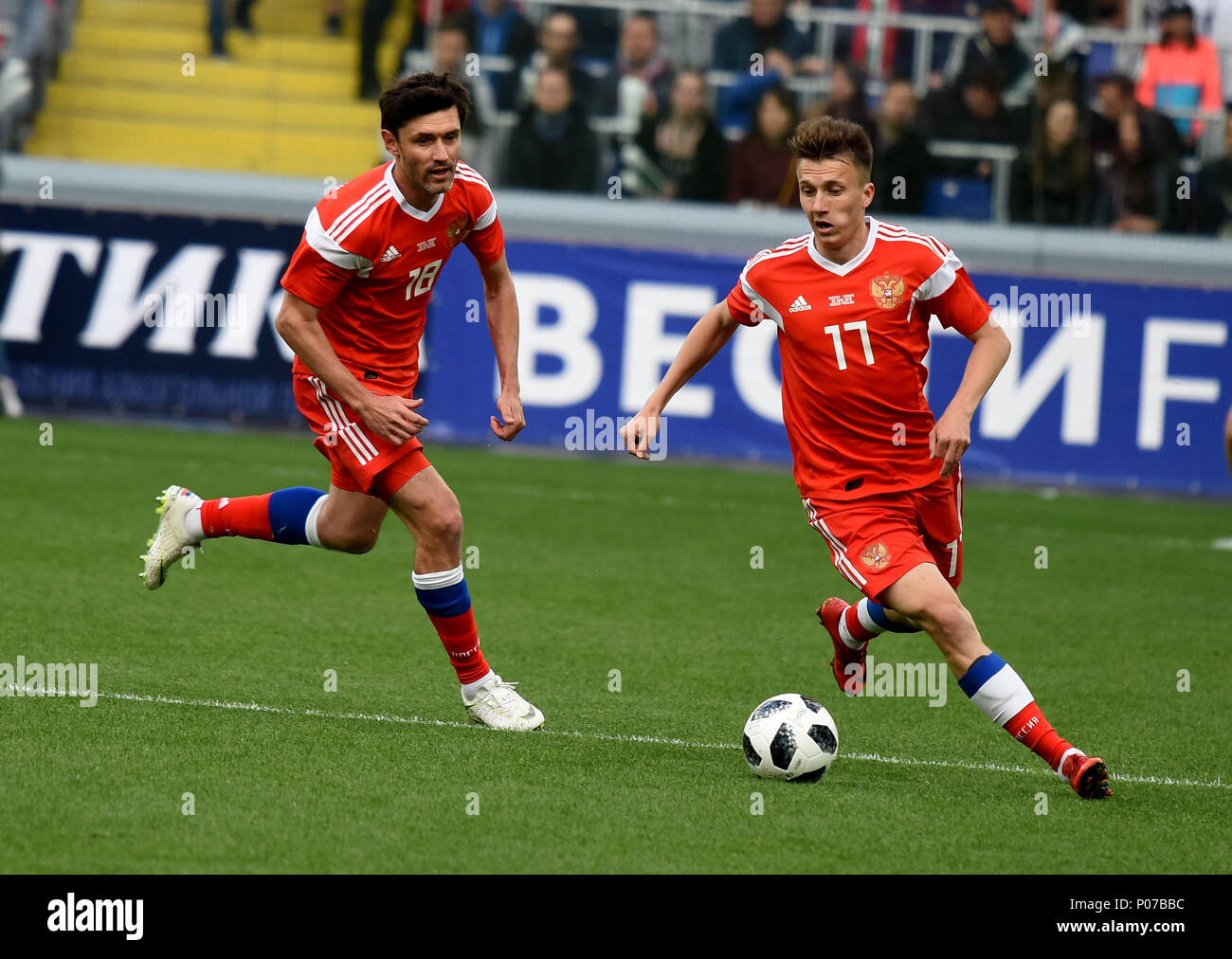 Moscow, Russia - June 5, 2018. Russian left back Yury Zhirkov and midfielder Alexander Golovin against Turkish defender Sener Ozbayrakli during intern Stock Photo
